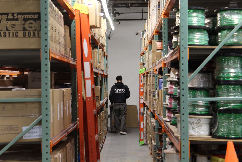 Revco Bohemia stocked warehouse aisle with electrical supplies and cable products